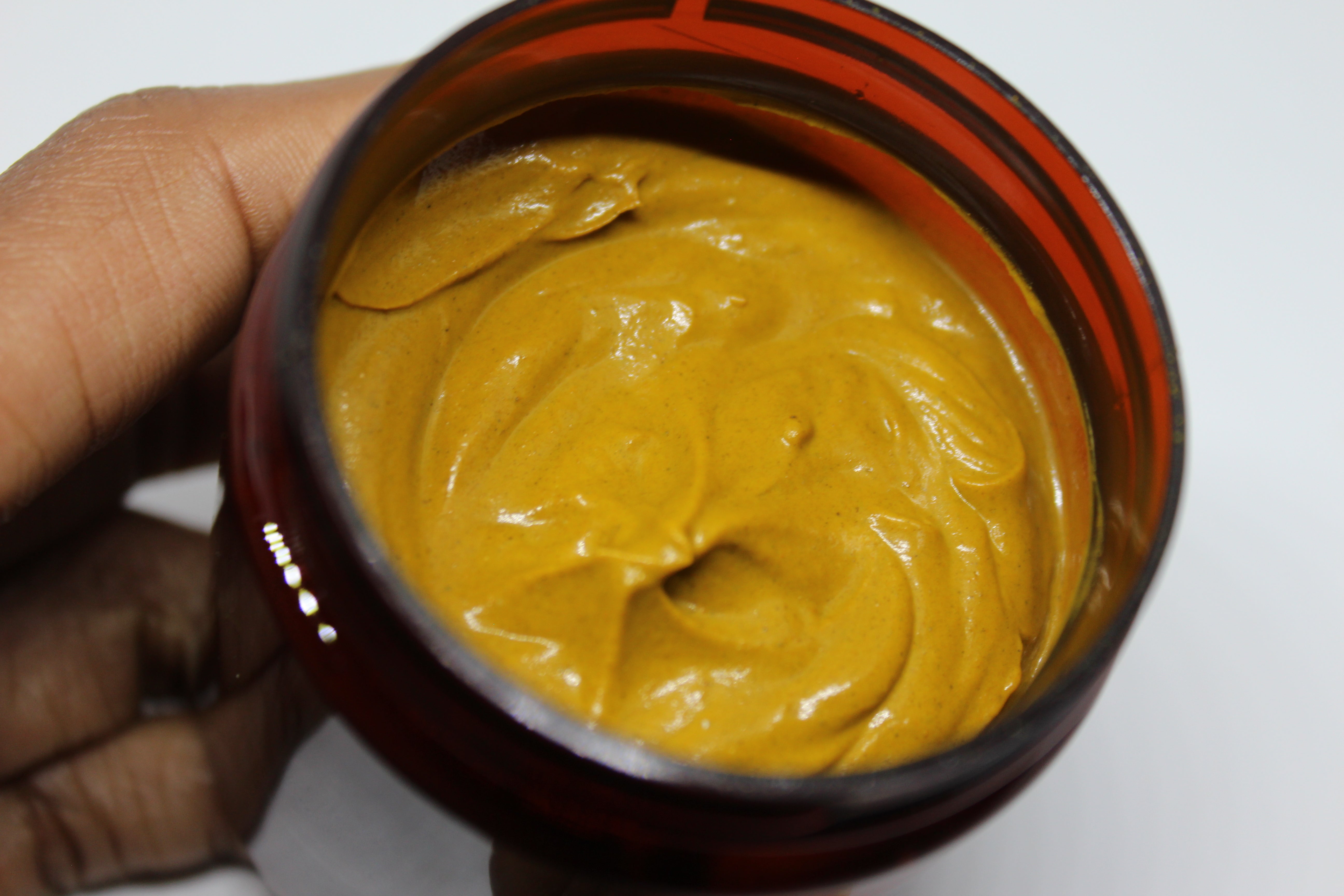 KSR Natural Purifying Clay Mask 'Face it' Container, a view of the inside, it has a golden tone.