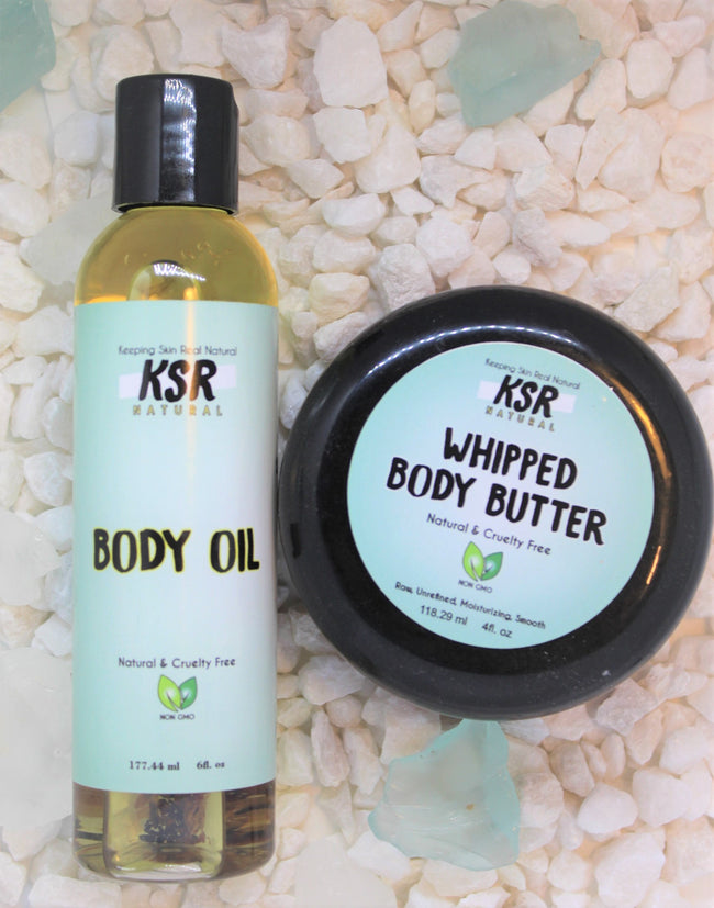 KSR Natural Winter Duo (Body Oil and Whipped Butter) Containers Displayed on stones.